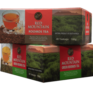 Rooibos tea and green rooibos tea boxes stacked on top of each other